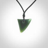 Hand carved pounamu niho, drop pendant. Jade necklace hand made in New Zealand.